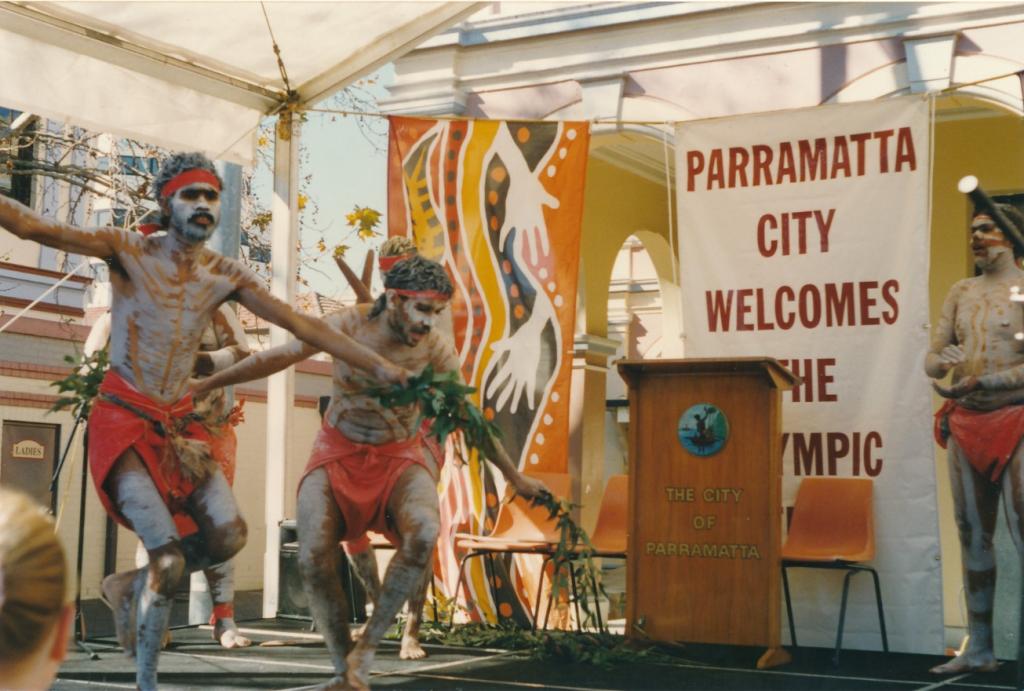 PRS118_086_001: Aboriginal dancers performing at the Olympic Flag in Parramatta ceremony, 1996 (City of Parramatta Council Archives)