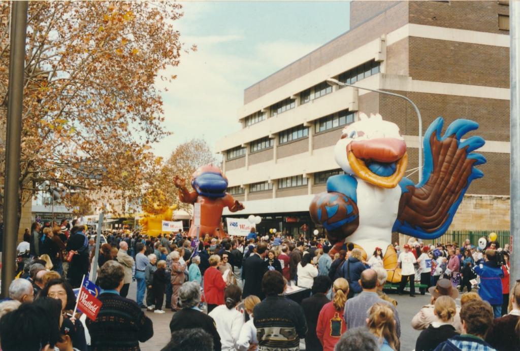 PRS118_089_002: Sydney 2000 Mascots at the Olympic Journey Parade in Parramatta, 1997 (City of Parramatta Council Archives)
