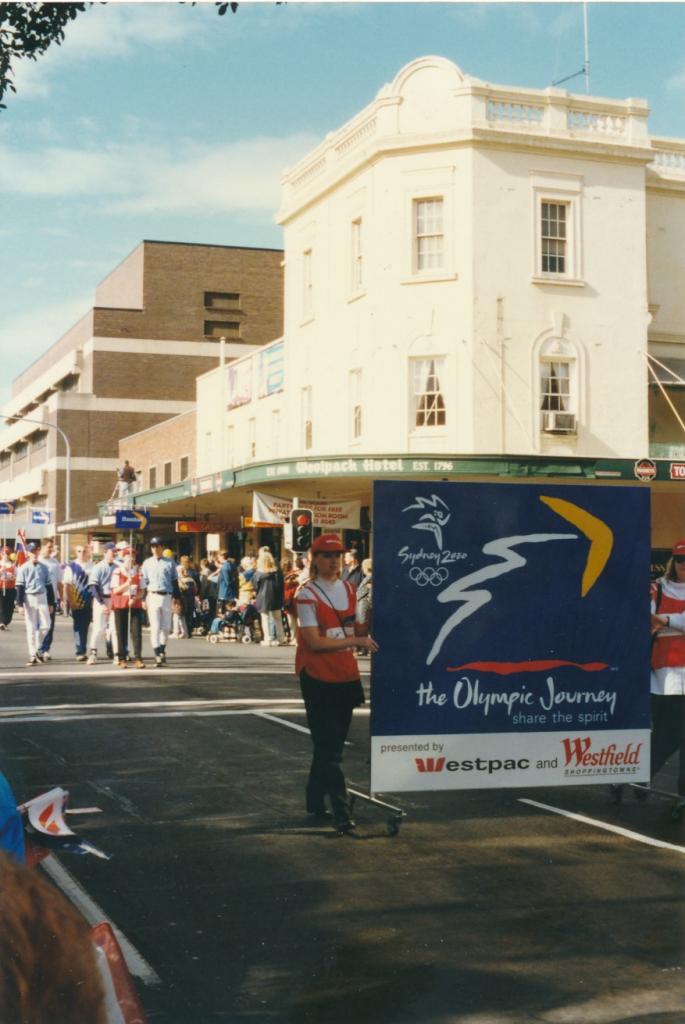 PRS118_090_002: Sydney 2000 banner at Olympics Parade in Parramatta, 1997 (City of Parramatta Council Archives)