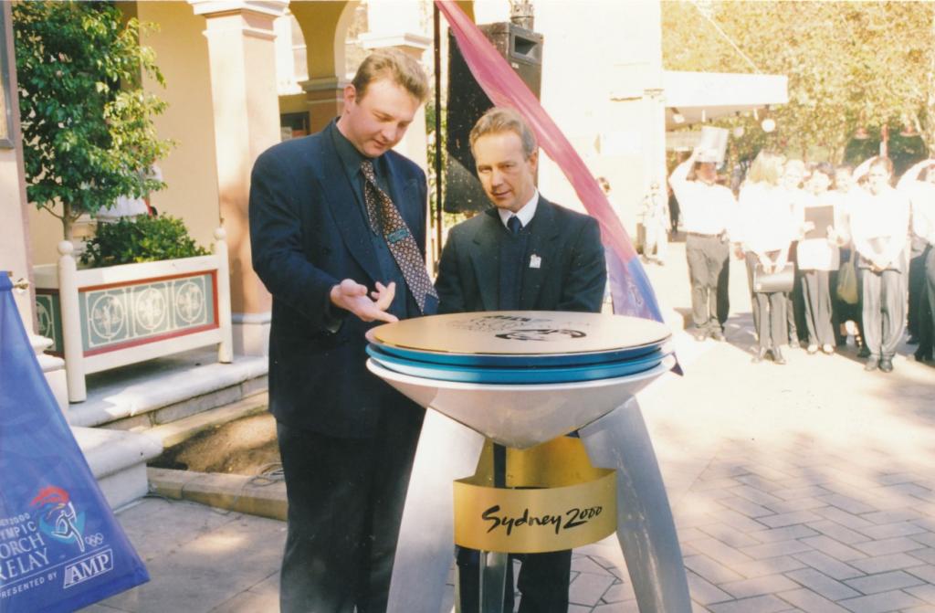 PRS118_105_002: Lord Mayor David Borger (left) with Sydney Olympics Cauldron in Parramatta, 2000 (City of Parramatta Council Archives)