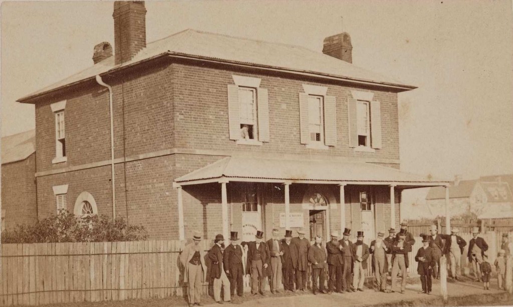 Council members standing outside Elder's House