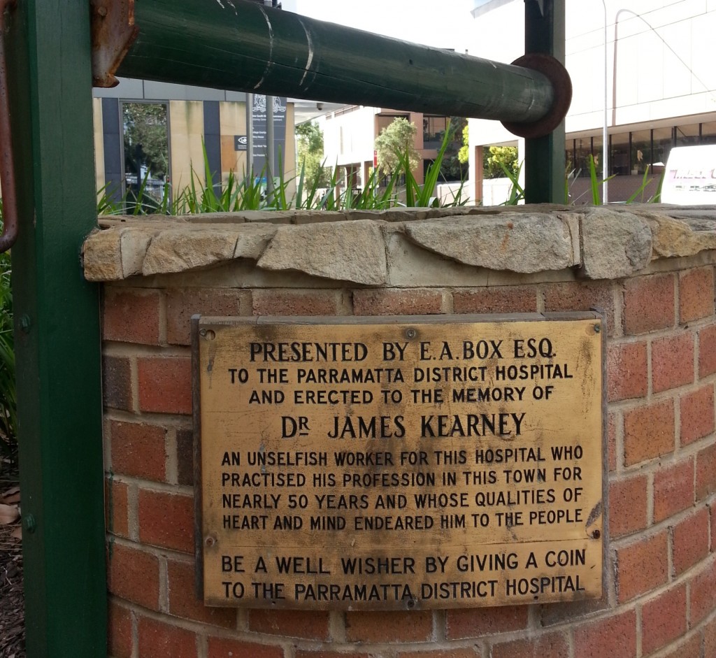 Original plaque dedicating the wishing pool to Dr Kearney