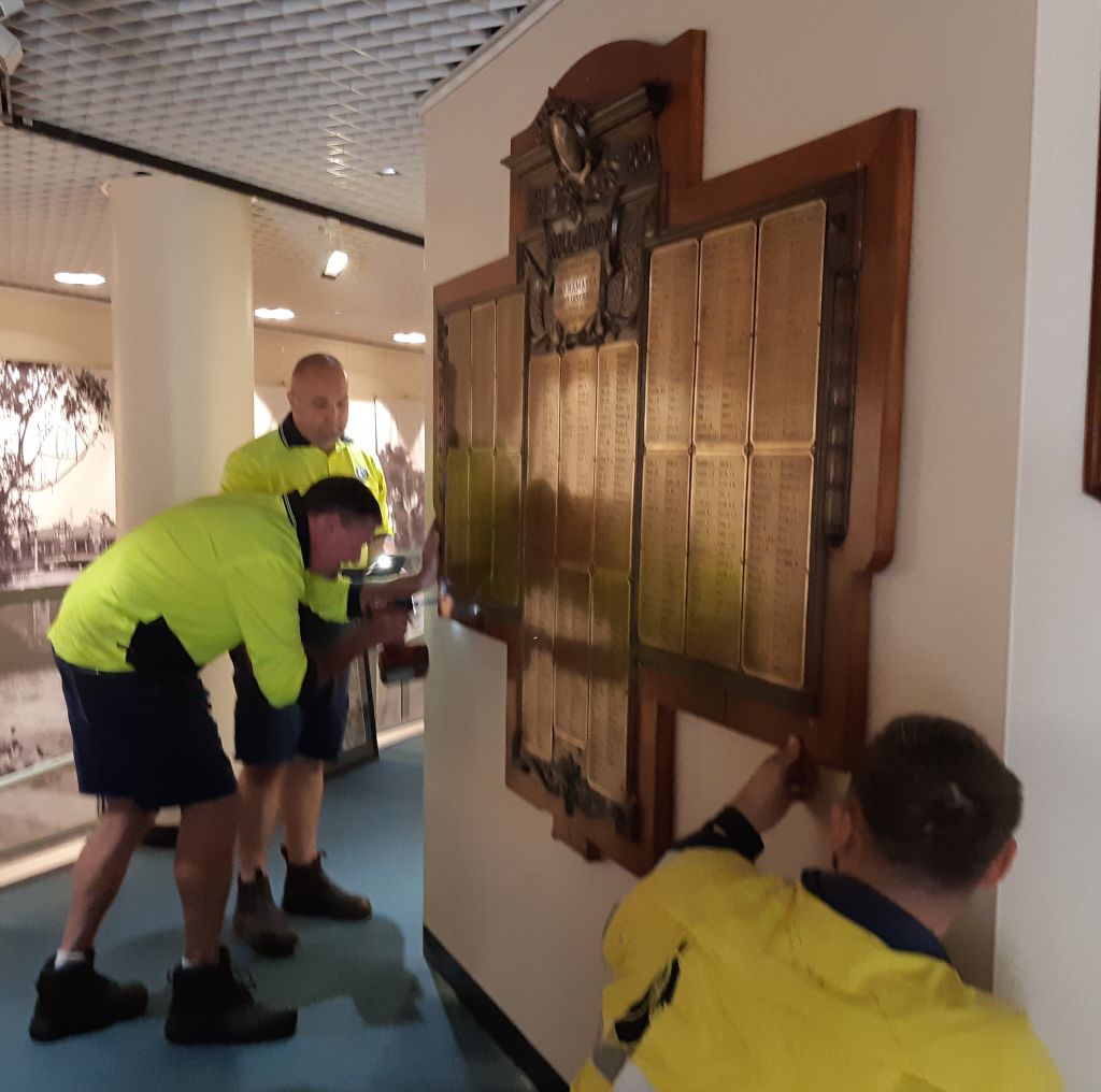 Council team mounting the honour board at the Heritage Centre