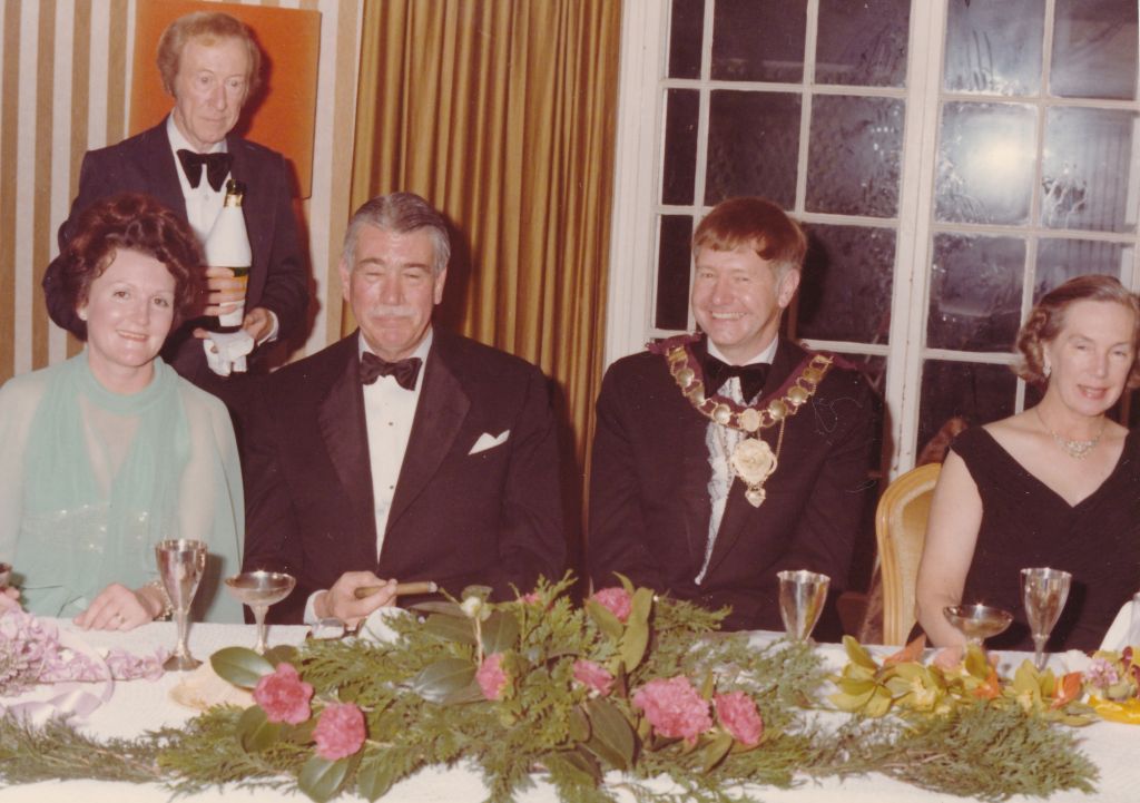 Parramatta Mayoral Ball 1976 : Group photo of main table with Mayor, Sir Roden Cluter and two women. City of Parramatta Archives: ACC002/081/178