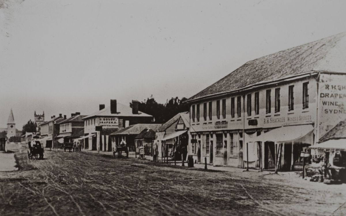 Church Street, Parramatta, with view of St. (Saint) John's and Scots Church (St. Andrew’s) in the distance, ca. 1861. City of Parramatta Local Studies Library: LSP00378.