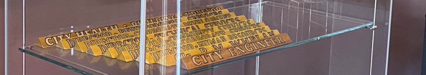 postion title plates on display