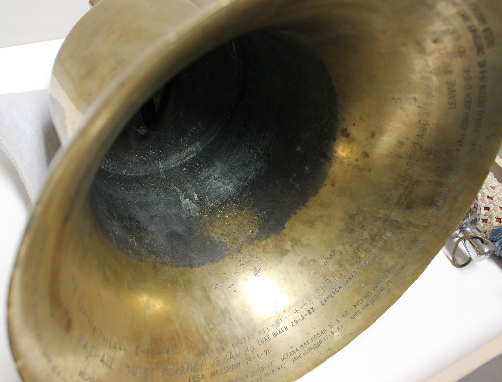 The Ship's Bell showing the engravings on the inside rim of the names of babies born to members of the crew. Parramatta Heritage Centre